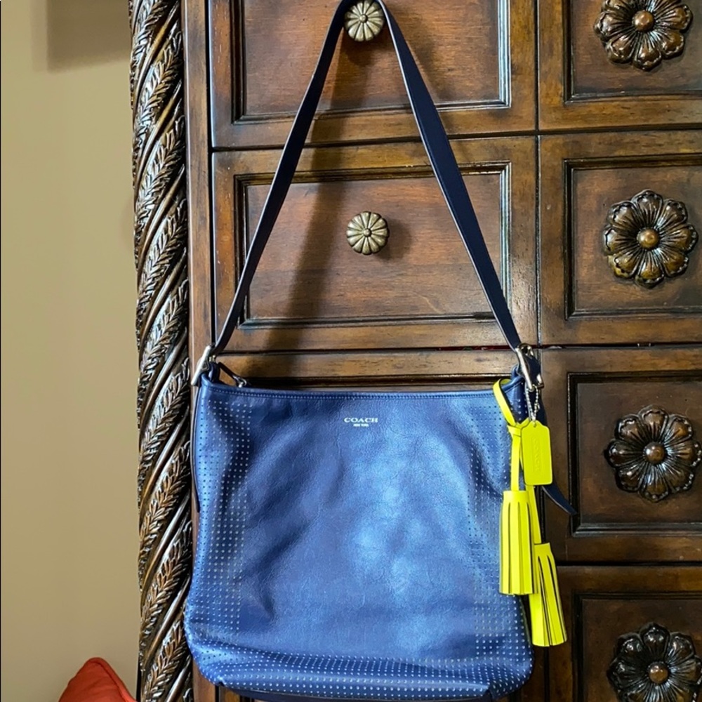 Coach Legacy Perforated Leather Crossbody bag.